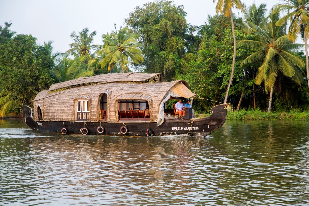 2400 kerala india 2015 boats at backwaters in kerala backwaters are extensive network of 41 west flowing rivers lakes and canals that center around alleppey kumarakom and punnamada