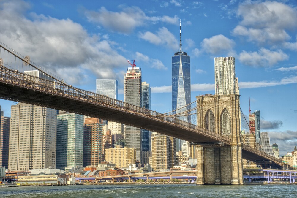 Downtown Manhattan with the Brooklyn Bridge and World Trade Center as Seen from DUMBO Brooklyn New York City 1182759699