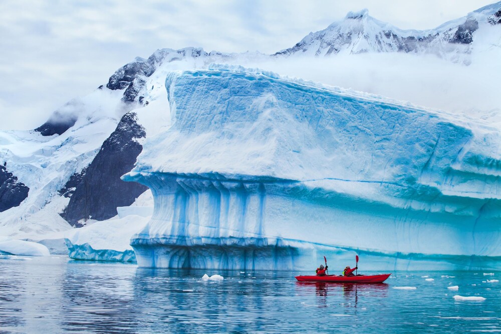 Kayaking Couple Large Iceberg Antarctica 2048x2048