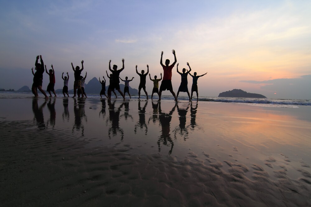 vecteezy group of happy young people silhouettes jumping on the beach 10257807