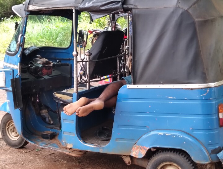 Sharon snoozing tuk tuk driver